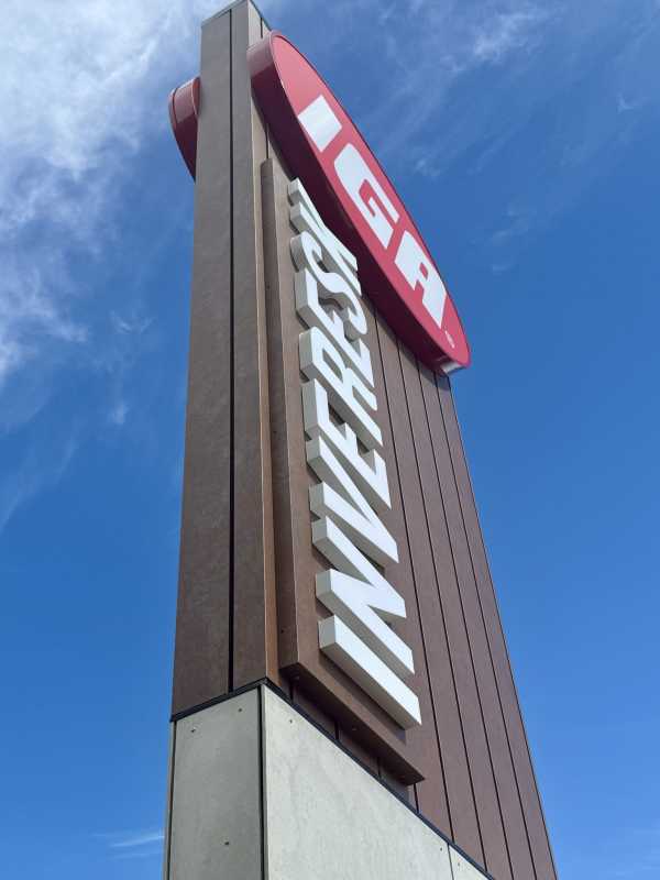 IGA Pylon signage fabricated lettering illuminated